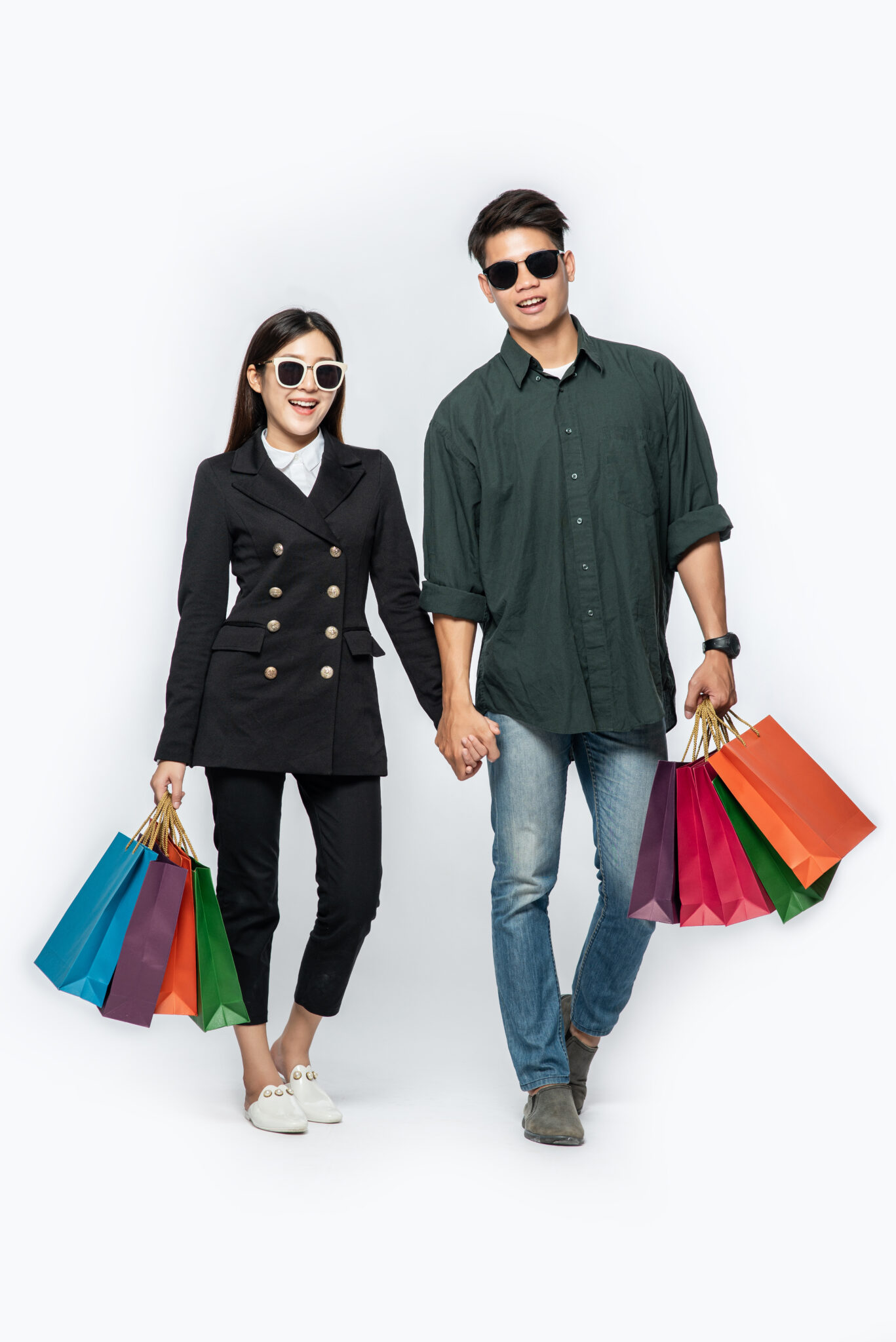a pair of men and women wore glasses and carried lots of paper b